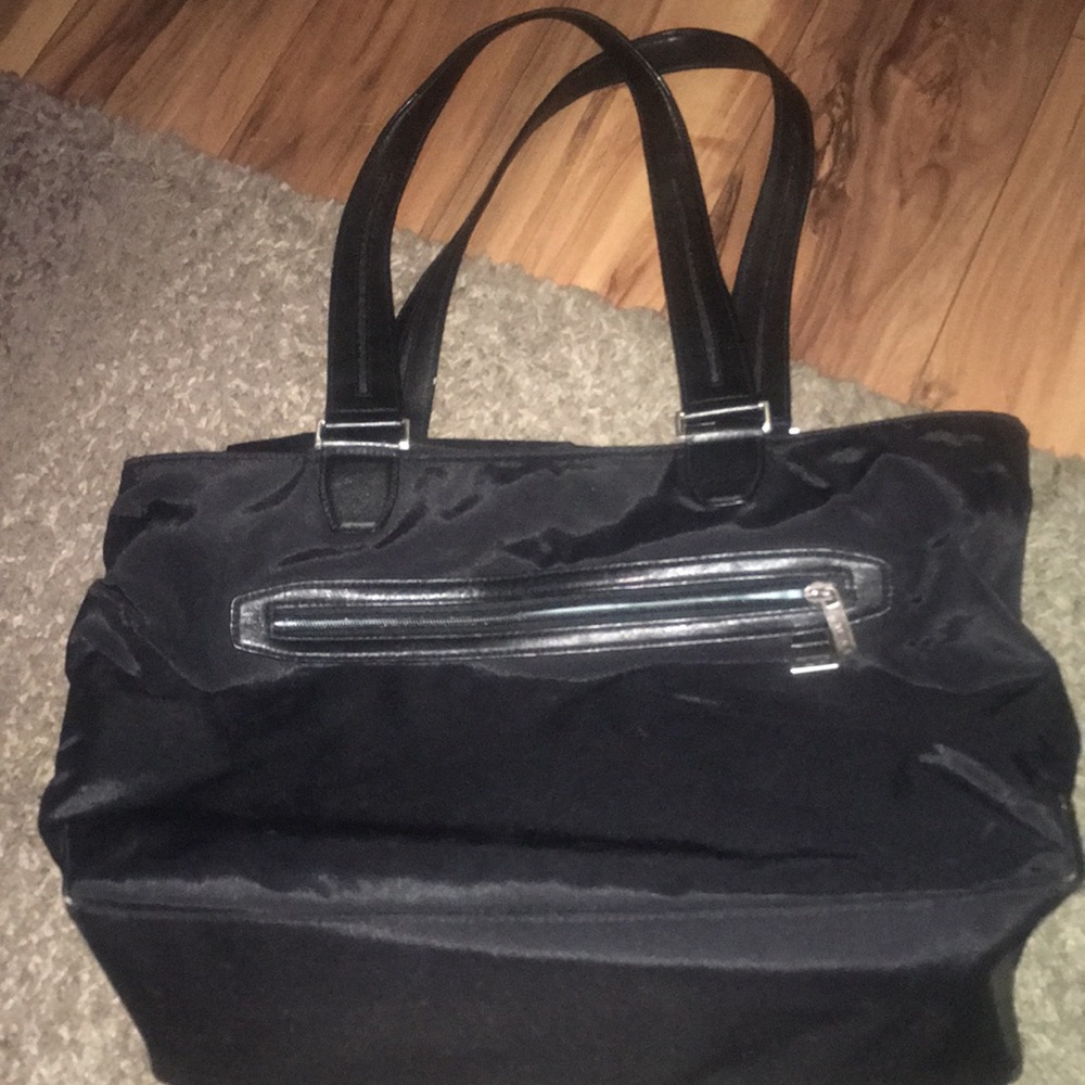 TUMI TOTE!